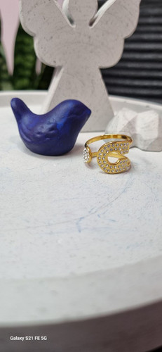 انگشتر استیل طلایی طرح سنجاق نگین دار