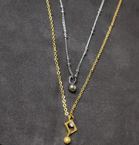 گردنبند استیل دو لاین نقره ای و طلایی لوزی نگین دار